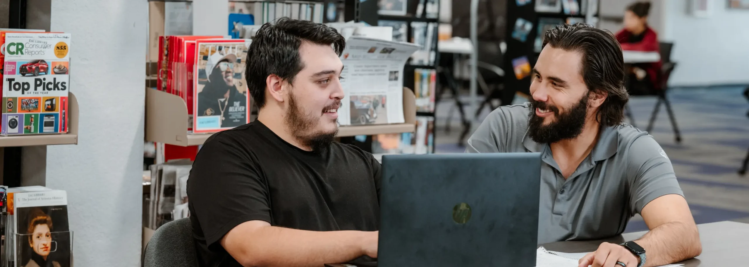 A student receiving help from faculty