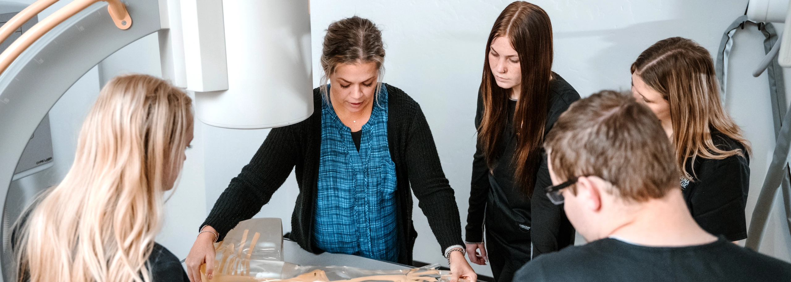 Teacher in radiology tech class with students
