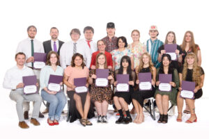 Students holding awards for the United Way Scholarship