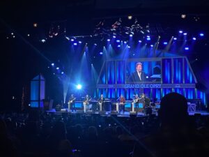 Musicians performing on stage.